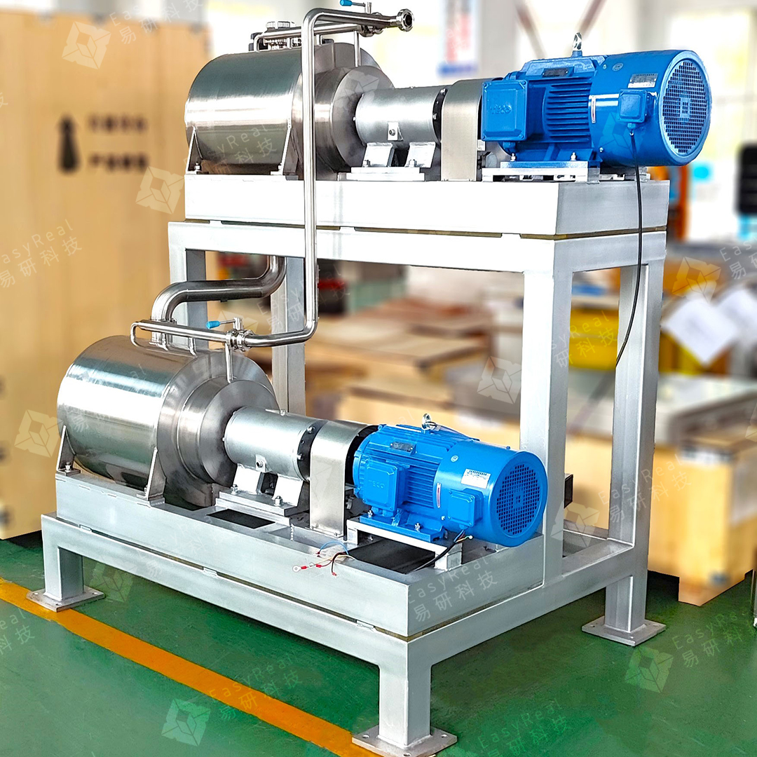 Actual two-stage fruit pulper with stainless chambers and separate blue motor drives