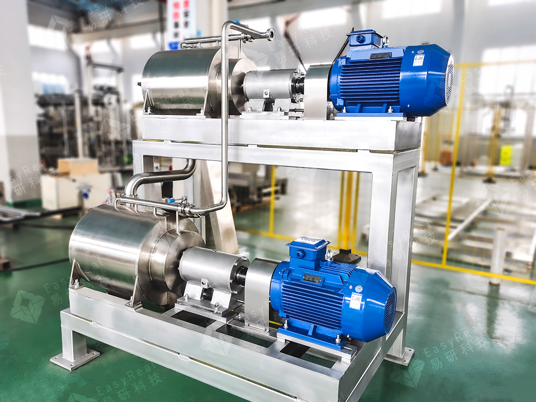Actual two-stage pulper showing interstage transfer piping and independent chamber drives